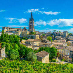 Aerial view of French village Saint Emilion dominated by spire of the monolithic church